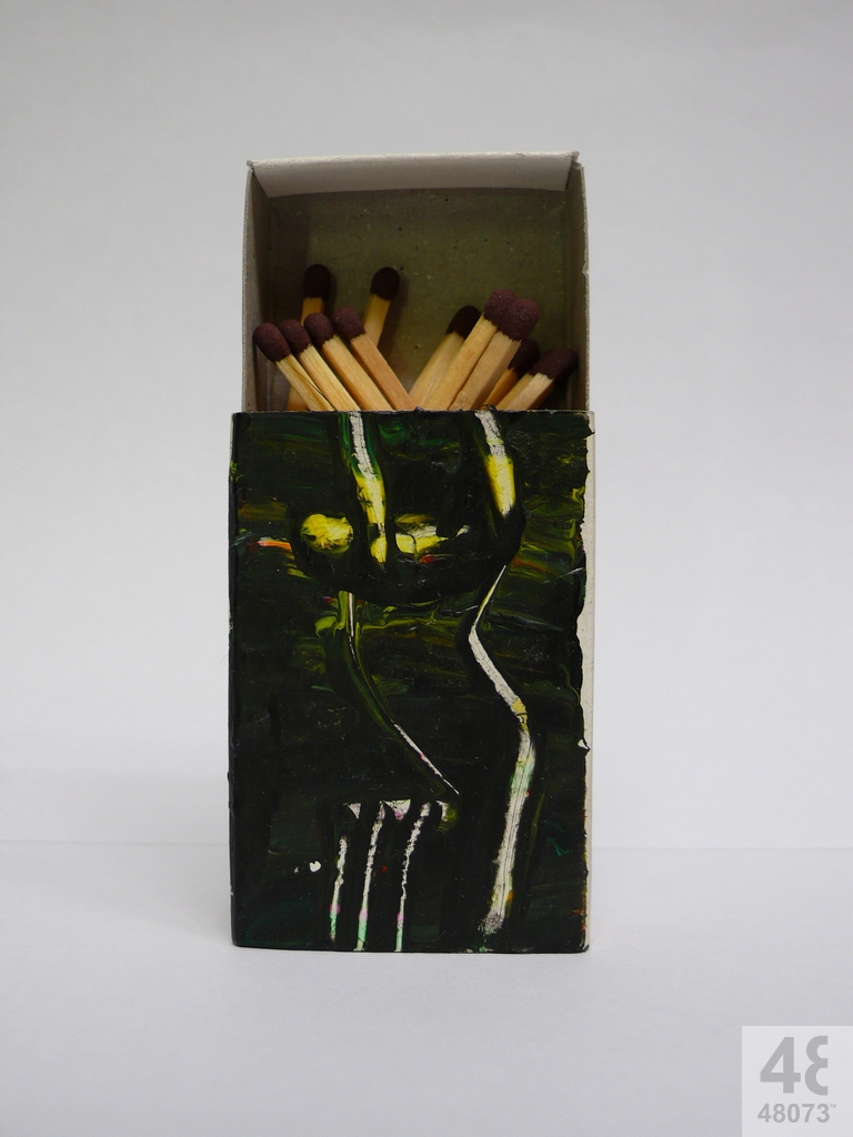 Small abstract painting on matchbox.