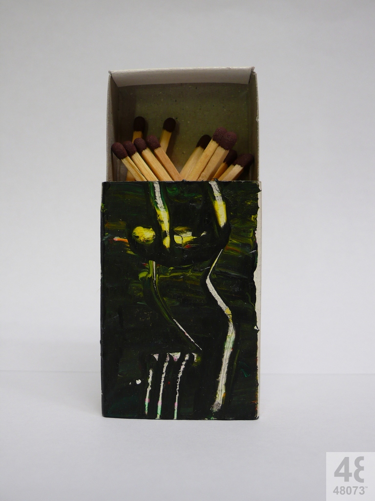 Small abstract painting on matchbox.