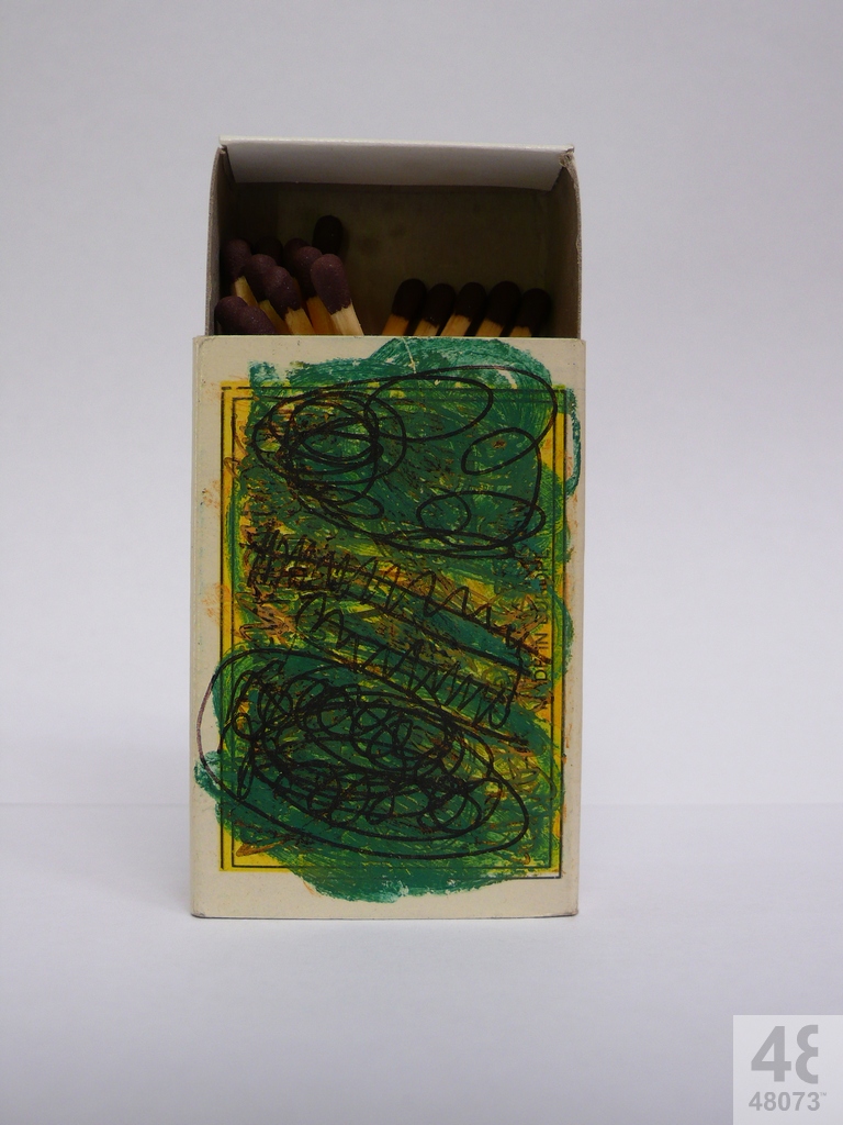 Small abstract painting on matchbox.