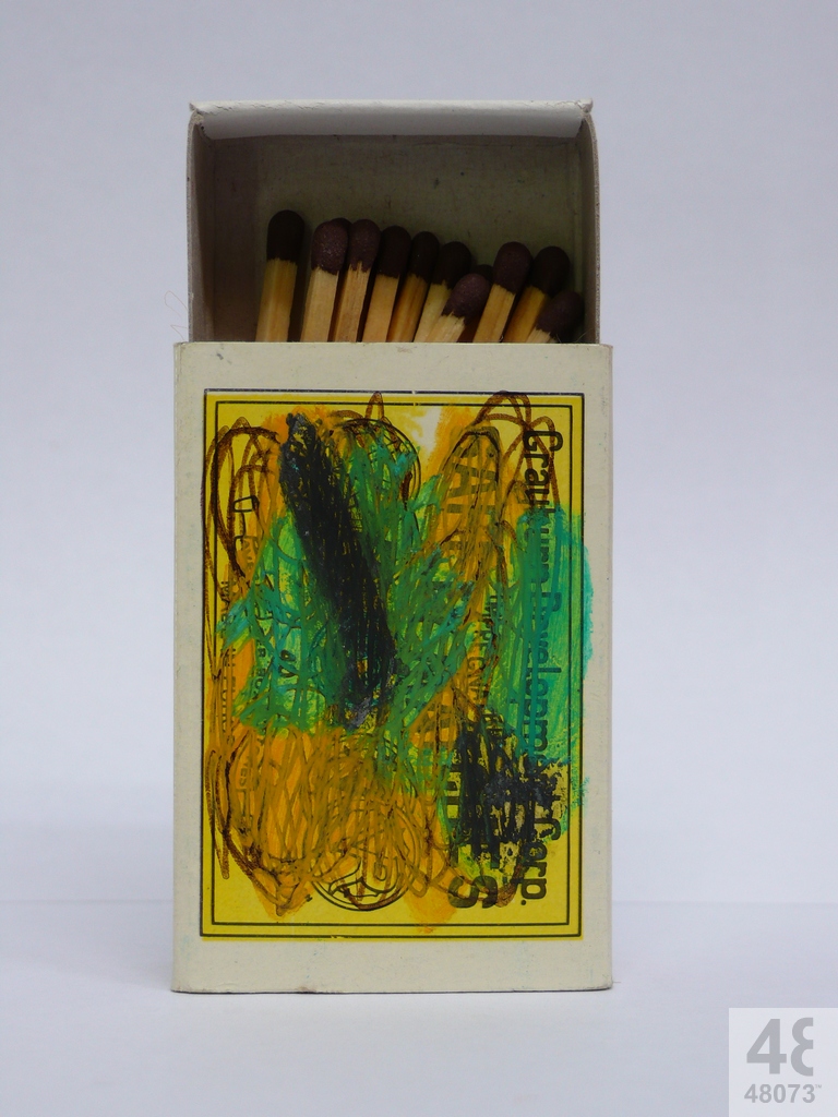 Small abstract painting on matchbox.