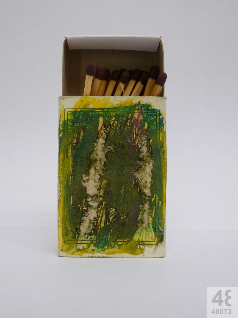 Small abstract painting on matchbox.