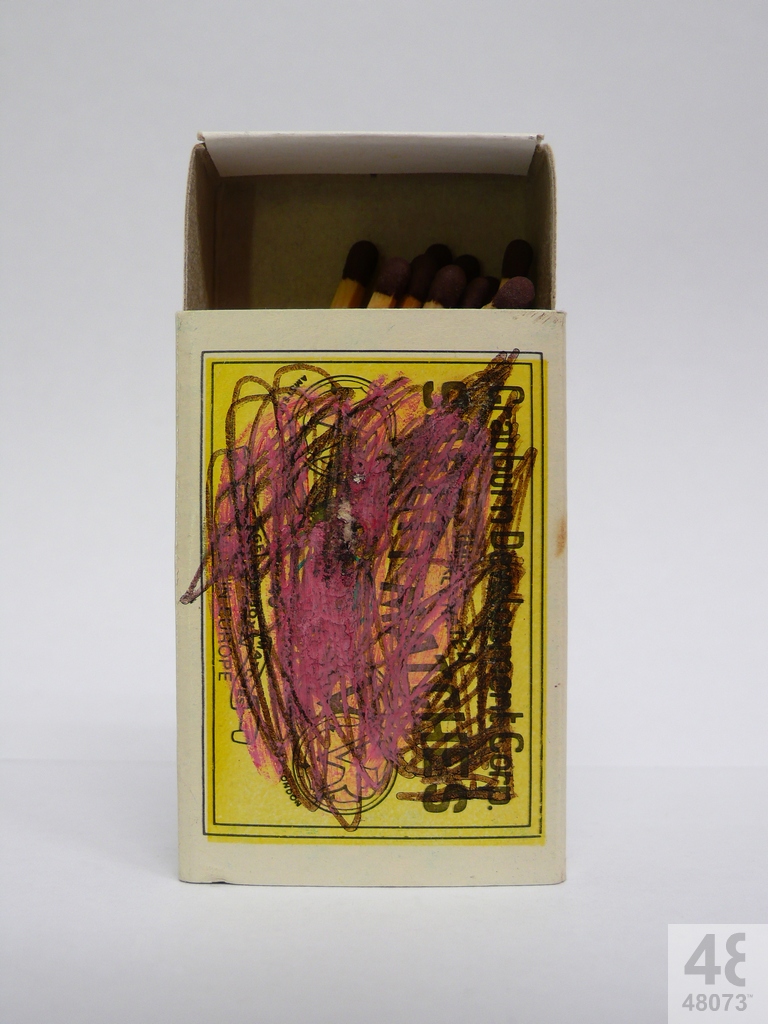 Small abstract painting on matchbox.