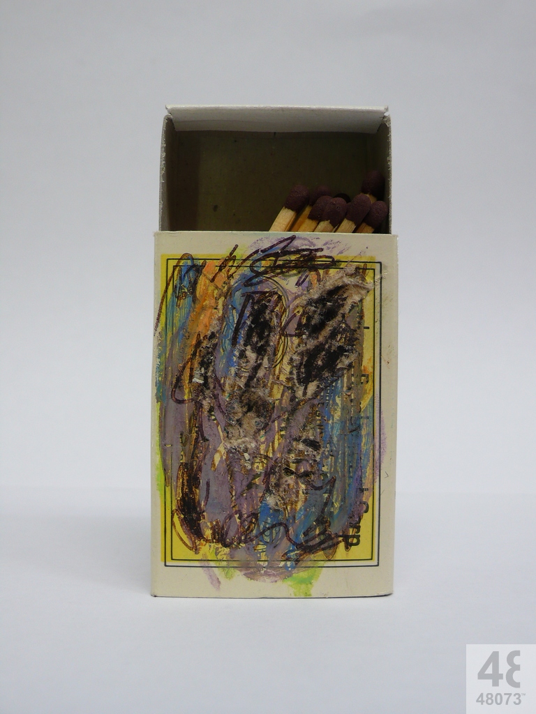 Small abstract painting on matchbox.