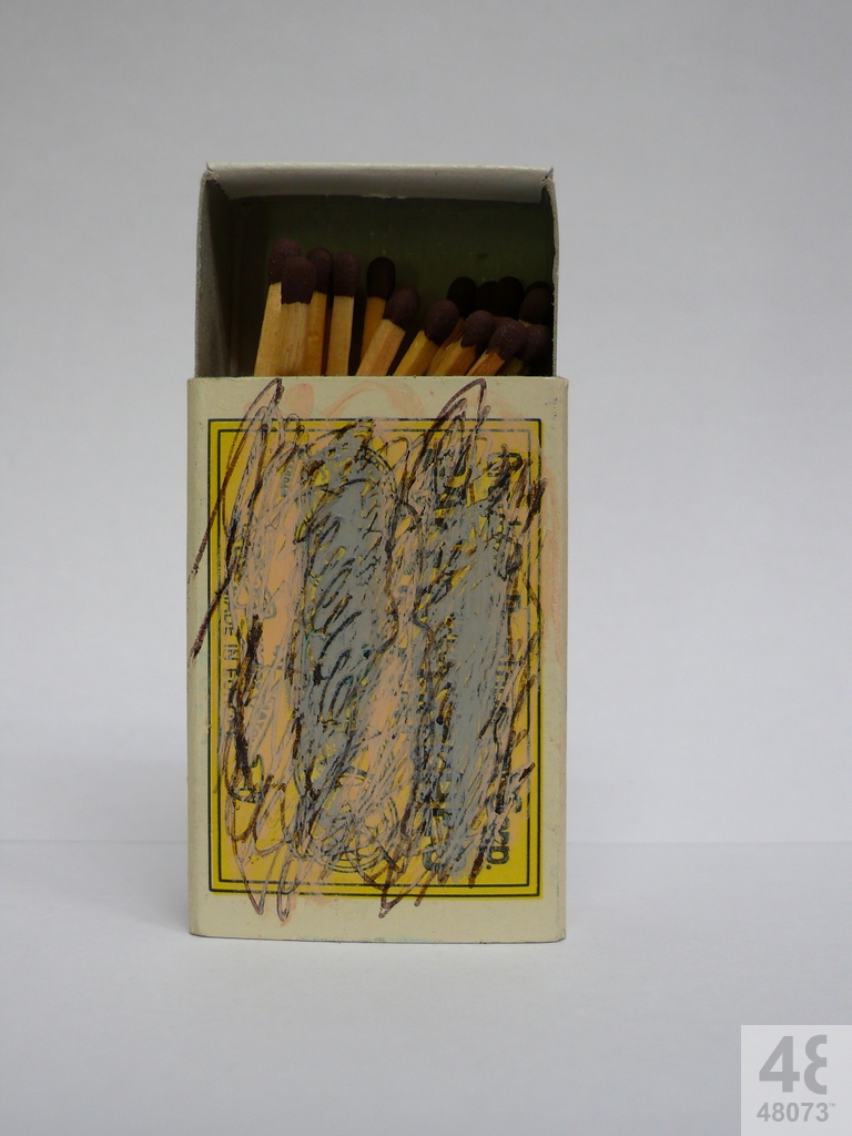 Small abstract painting on matchbox.