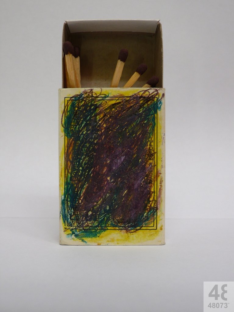 Small abstract painting on matchbox.