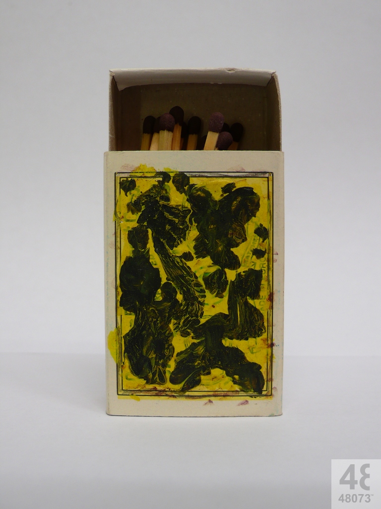 Small abstract painting on matchbox.