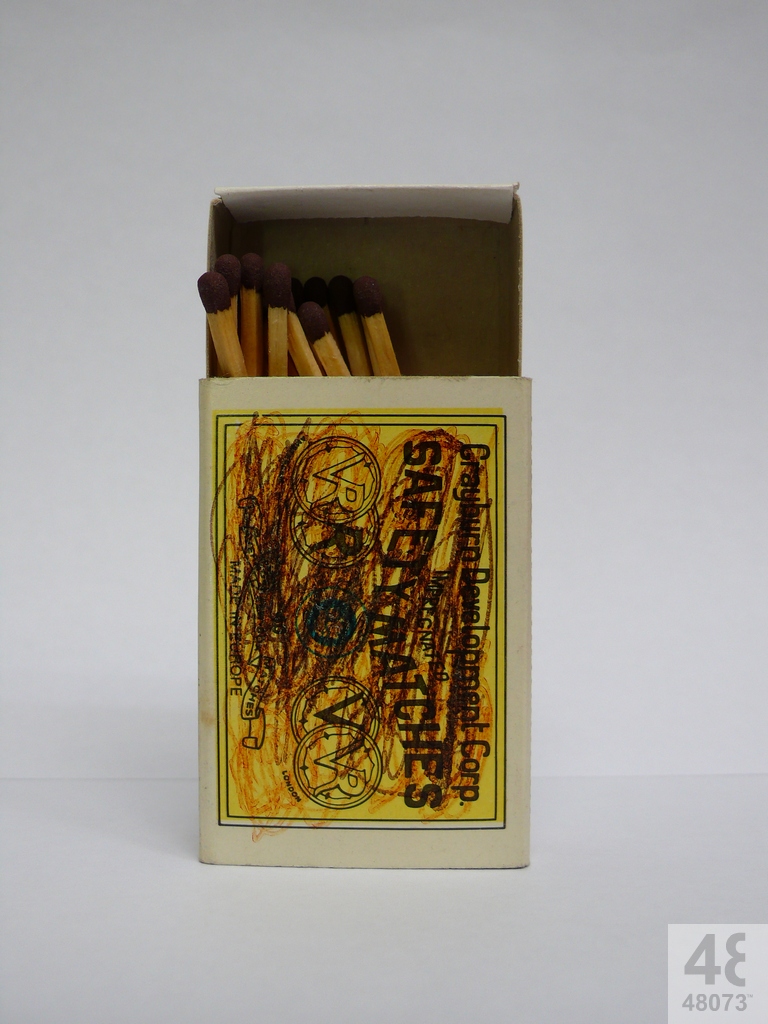 Small abstract painting on matchbox.