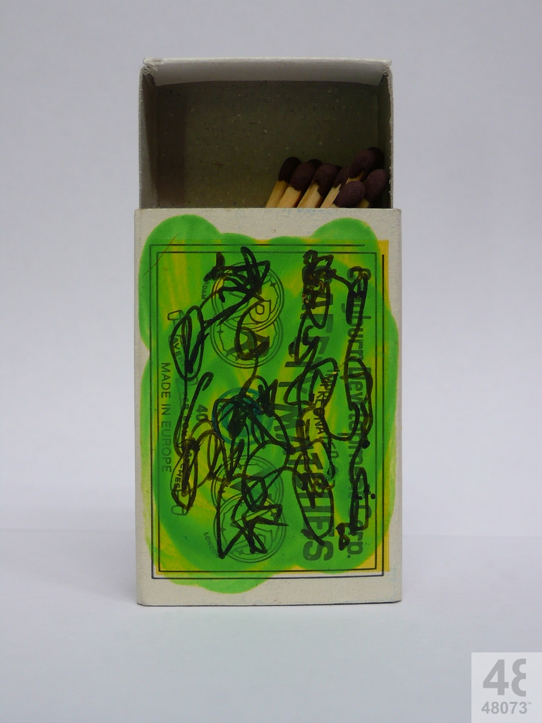 Small abstract painting on matchbox.