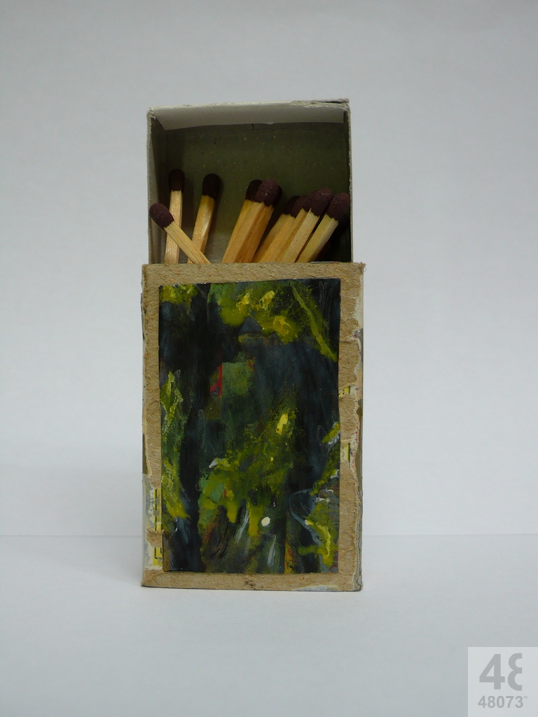 Small abstract painting on matchbox.