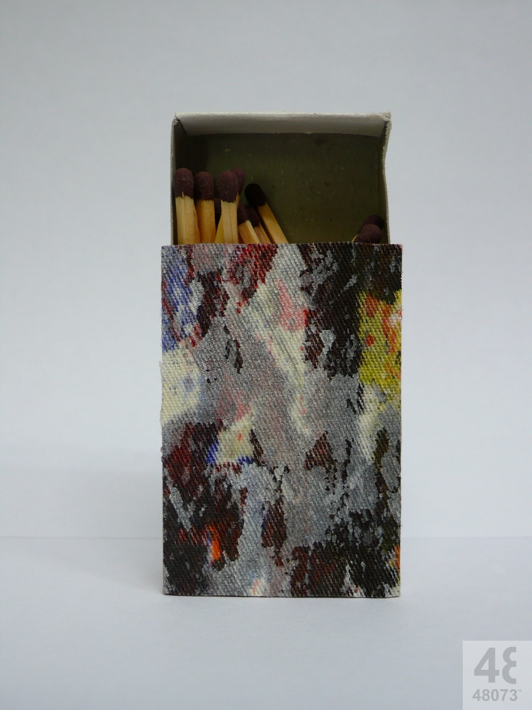 Small abstract painting on matchbox.