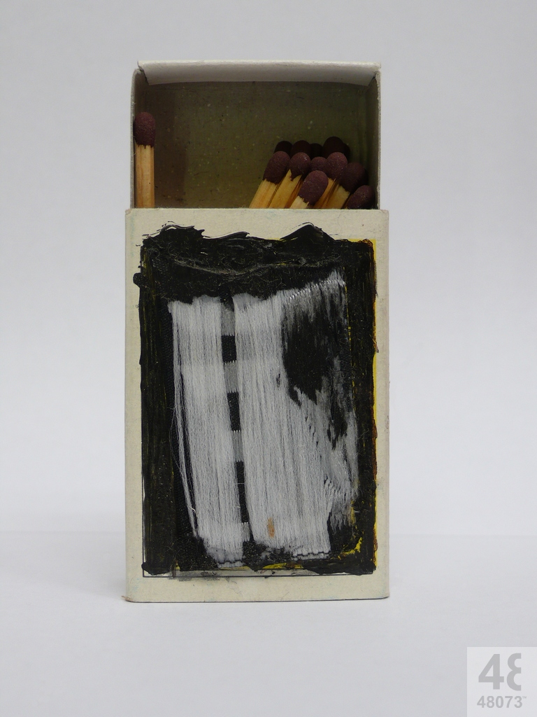 Small abstract painting on matchbox.