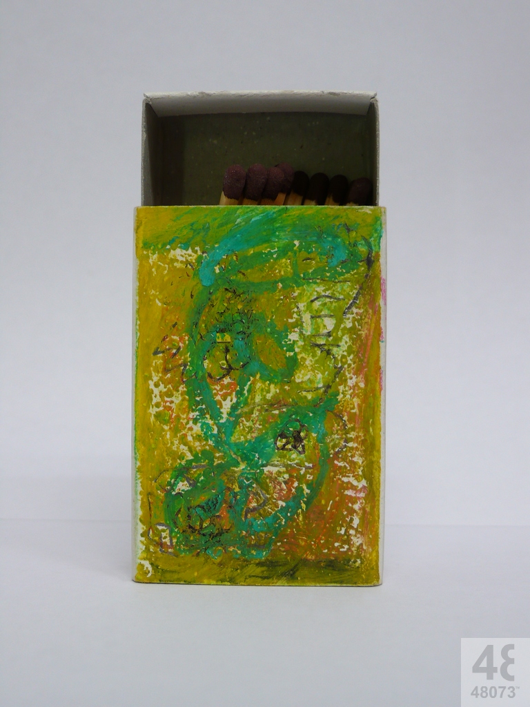 Small abstract painting on matchbox.