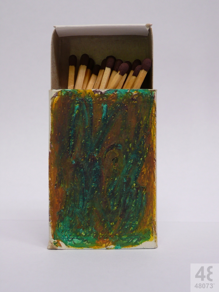 Small abstract painting on matchbox.