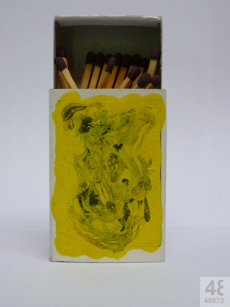 Small abstract painting on matchbox.