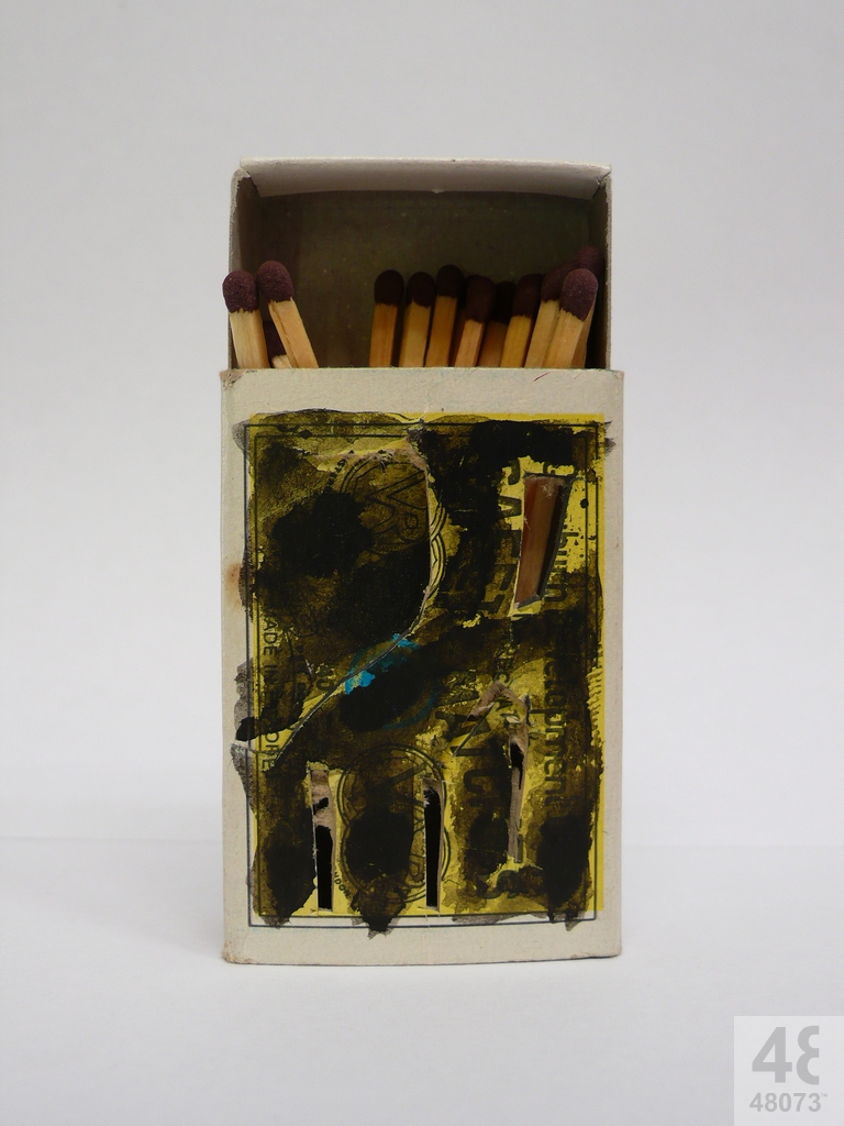 Small abstract painting on matchbox.