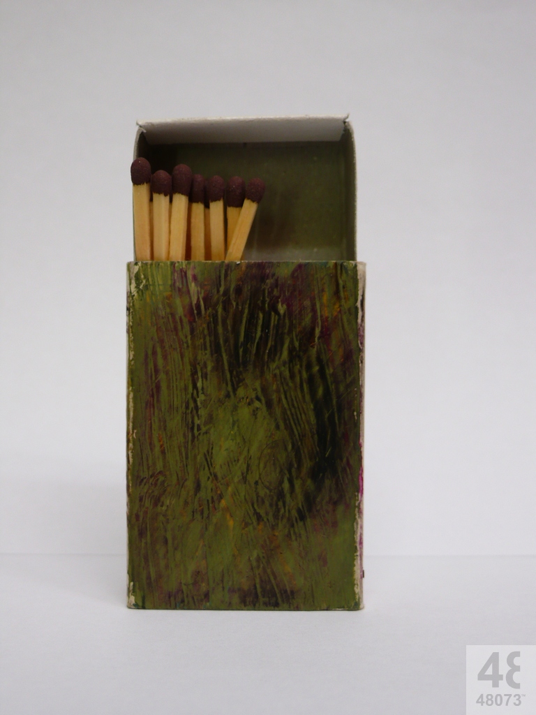 Small abstract painting on matchbox.