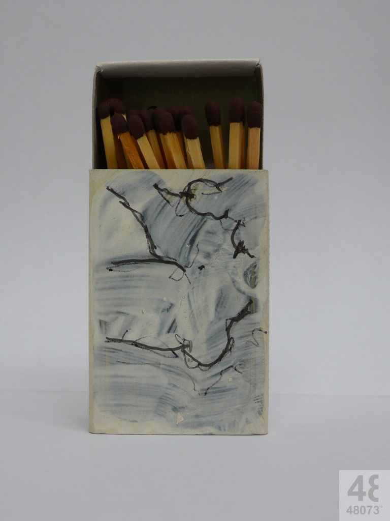 Small abstract painting on matchbox.