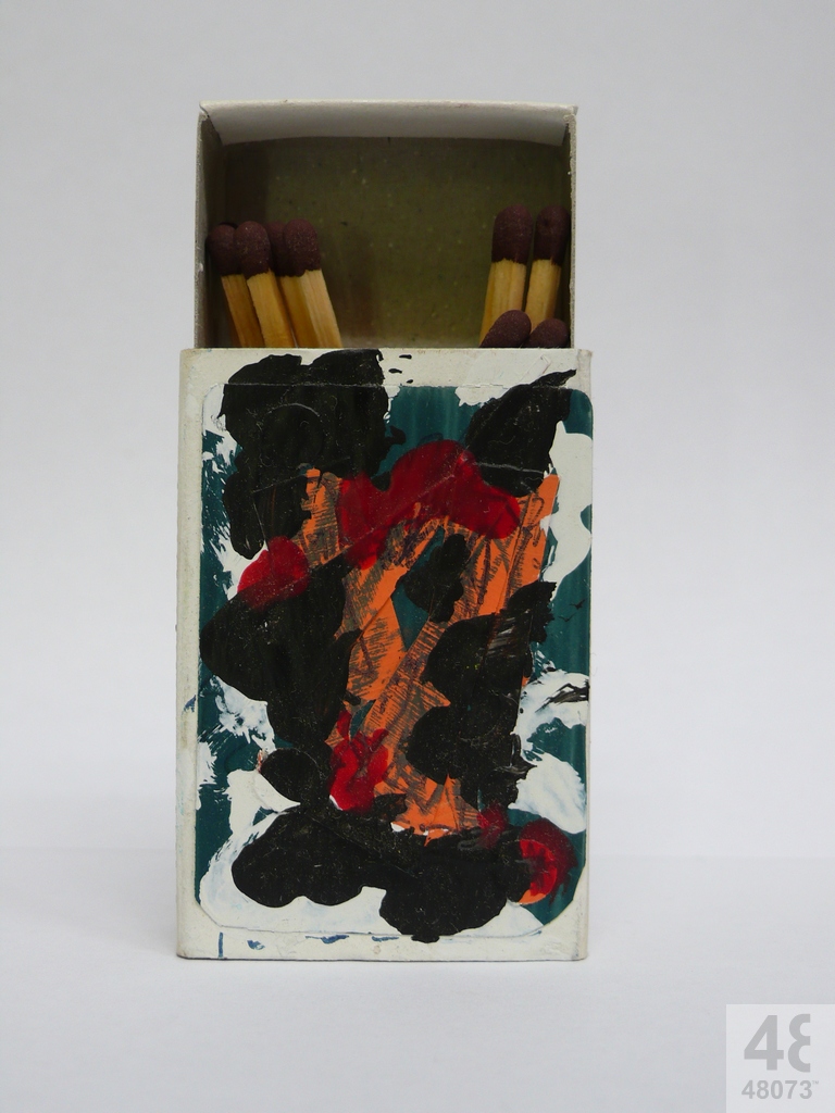 Small abstract painting on matchbox.