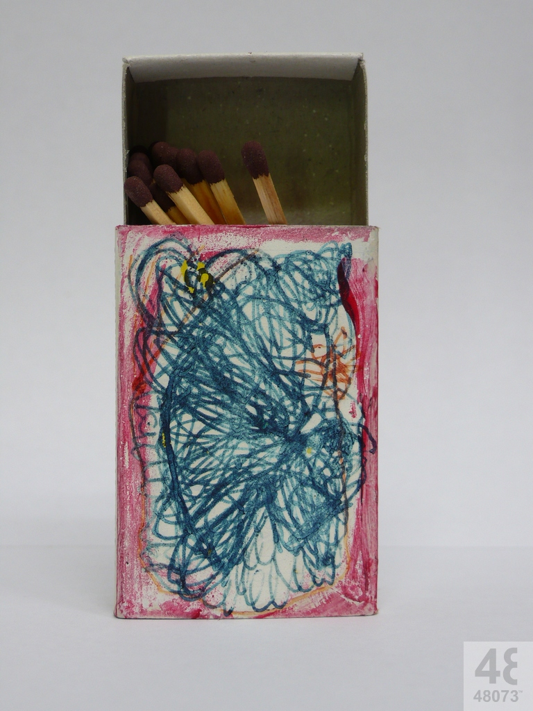 Small abstract painting on matchbox.