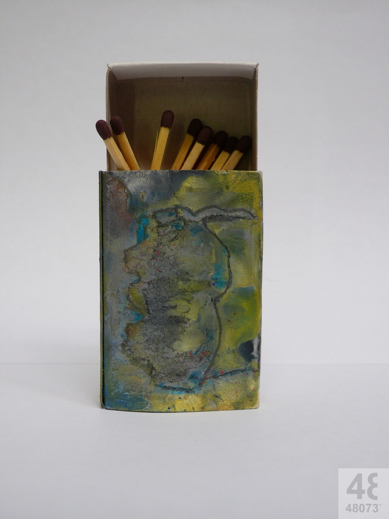 Small abstract painting on matchbox.