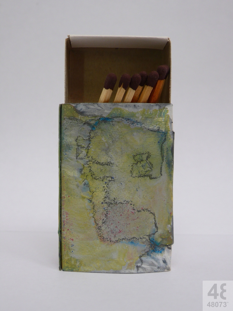 Small abstract painting on matchbox.