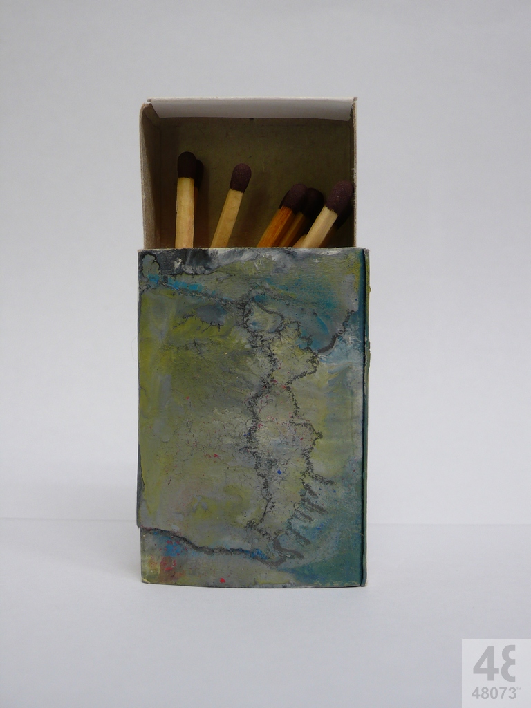 Small abstract painting on matchbox.