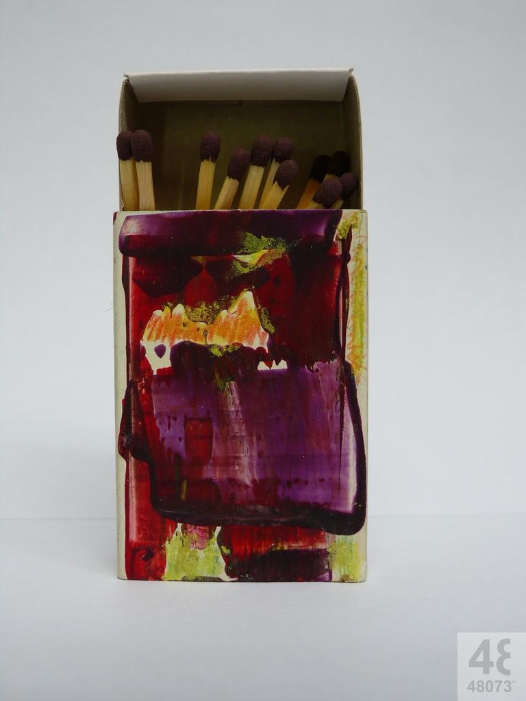 Small abstract painting on matchbox.