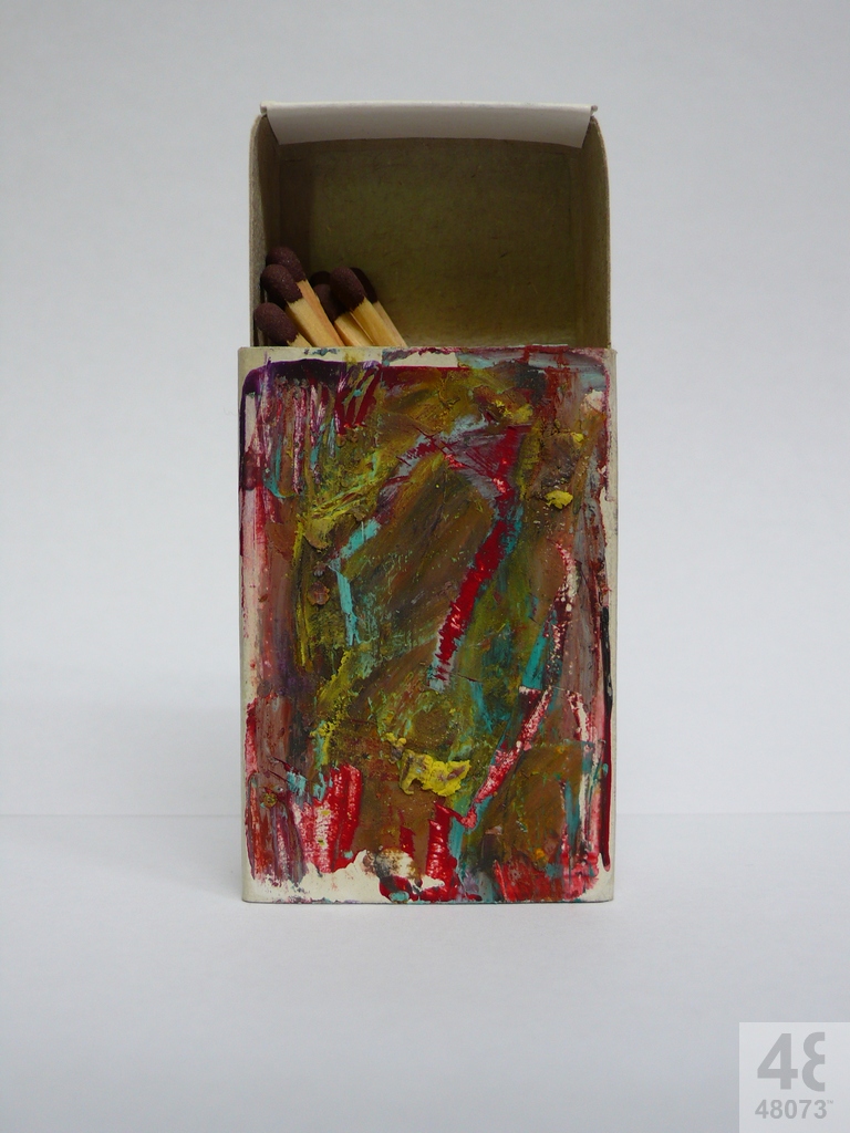 Small abstract painting on matchbox.