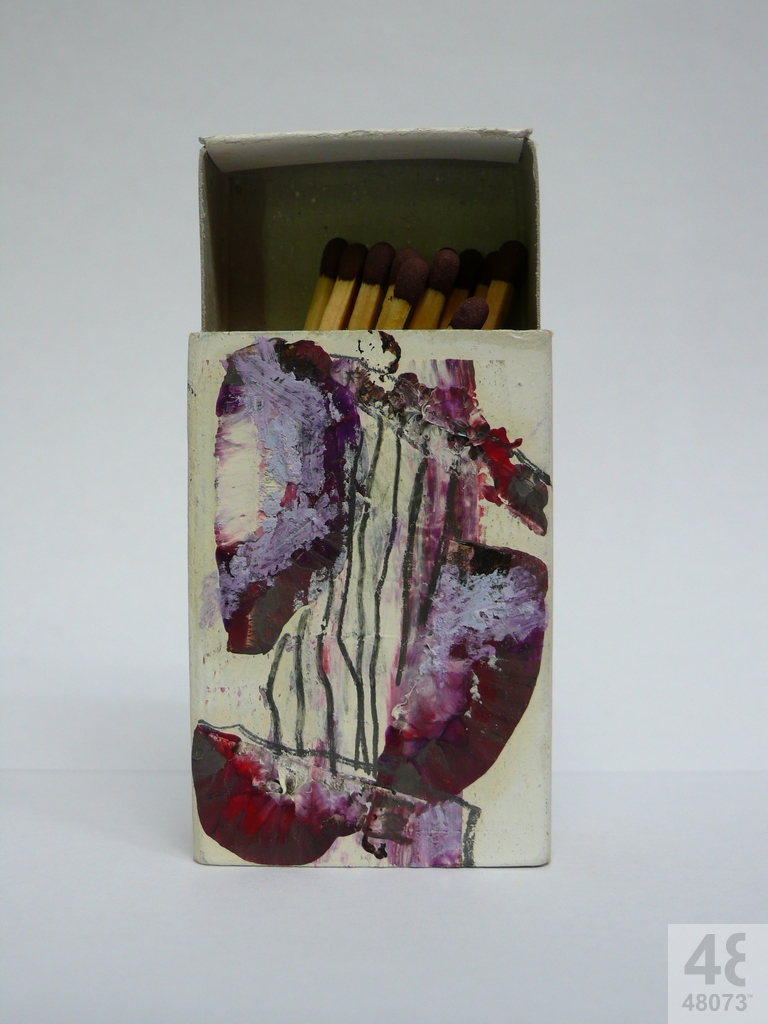 Small abstract painting on matchbox.