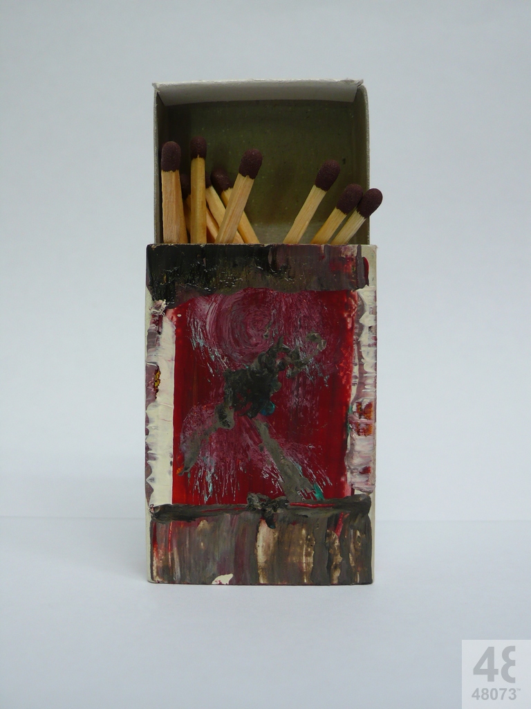 Small abstract painting on matchbox.