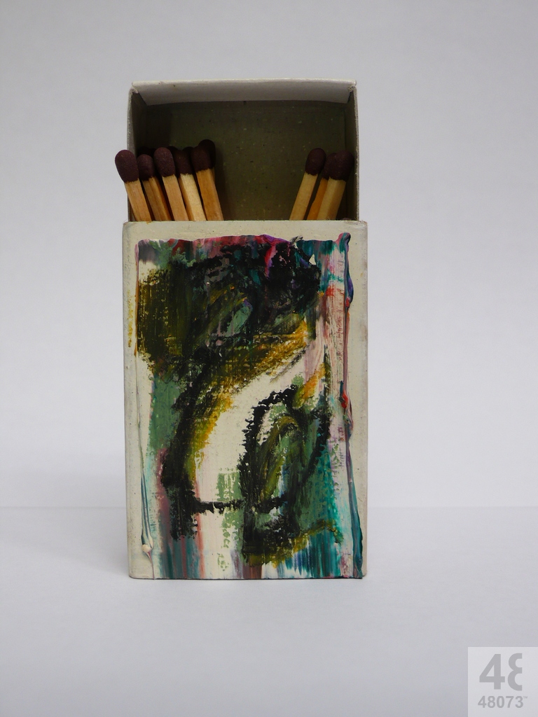 Small abstract painting on matchbox.