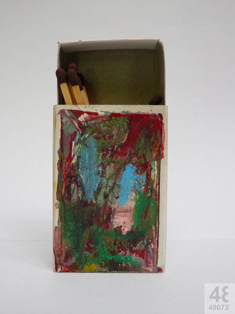 Small abstract painting on matchbox.