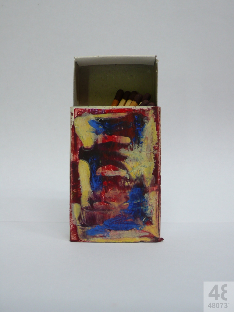 Small abstract painting on matchbox.