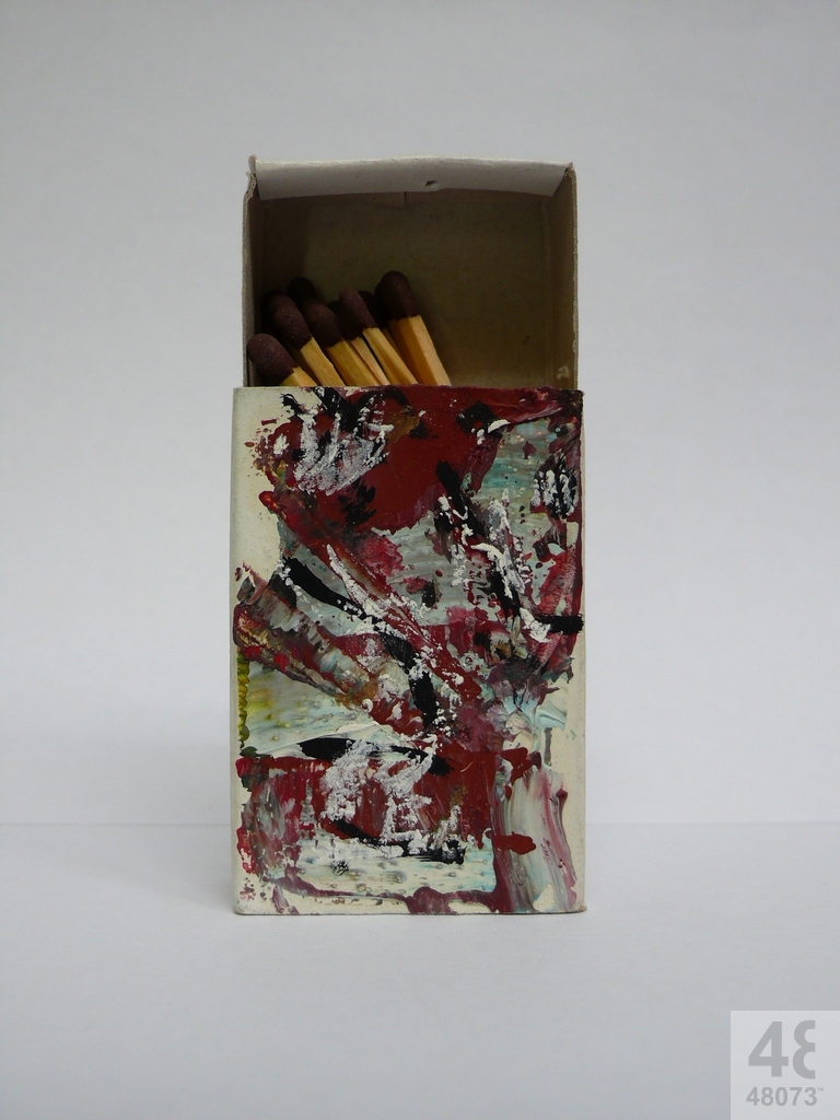 Small abstract painting on matchbox.