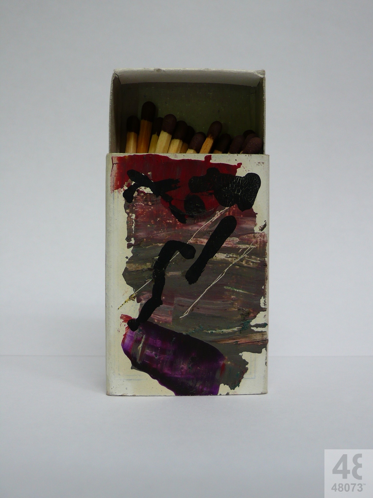 Small abstract painting on matchbox.