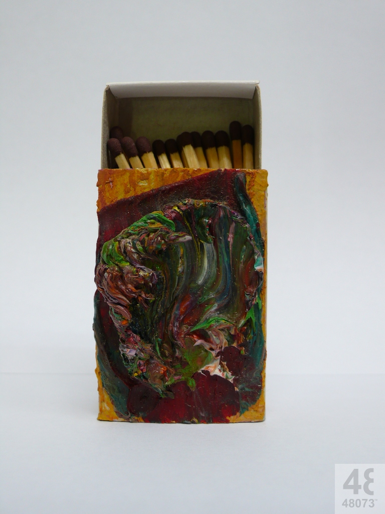 Small abstract painting on matchbox.