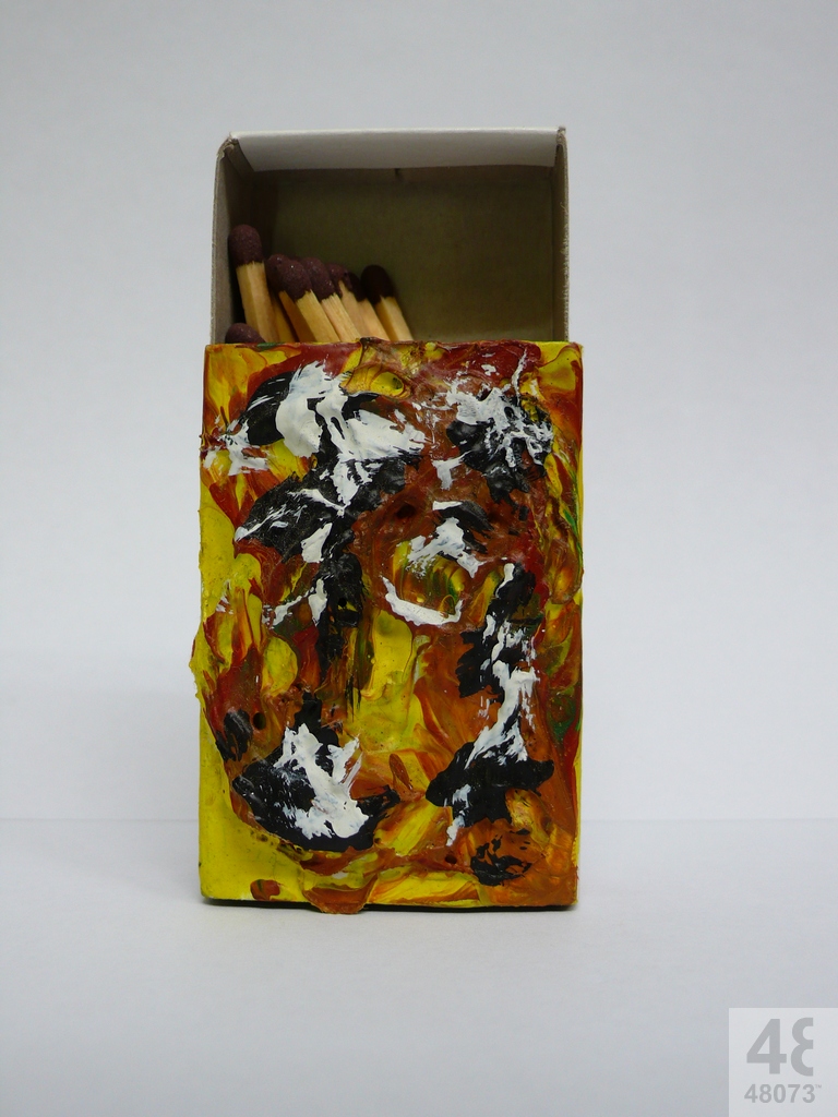 Small abstract painting on matchbox.