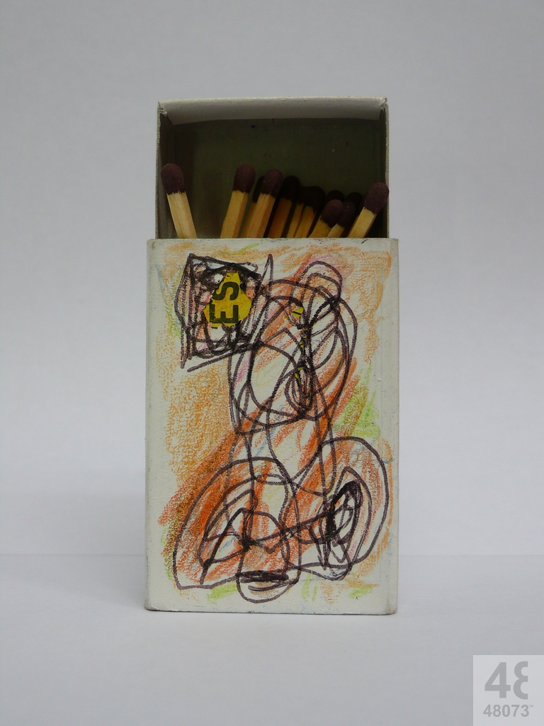 Small abstract painting on matchbox.