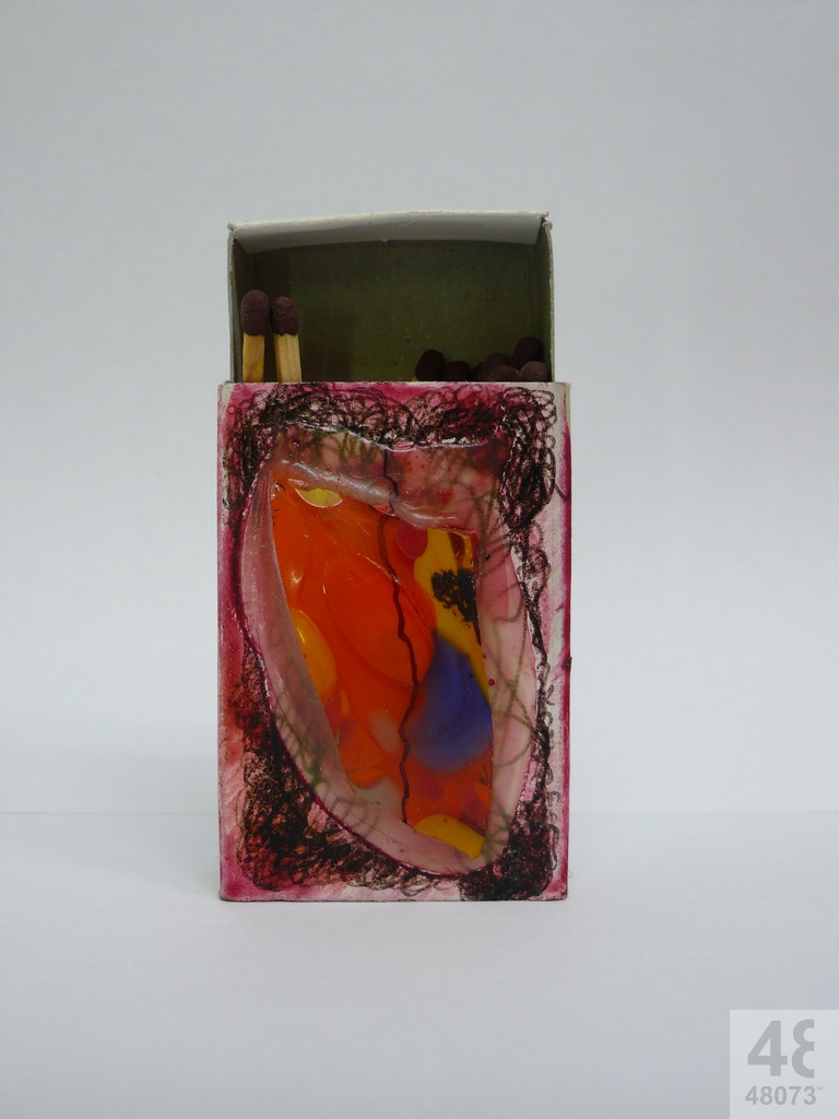 Small abstract painting on matchbox.