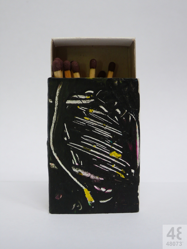 Small abstract painting on matchbox.