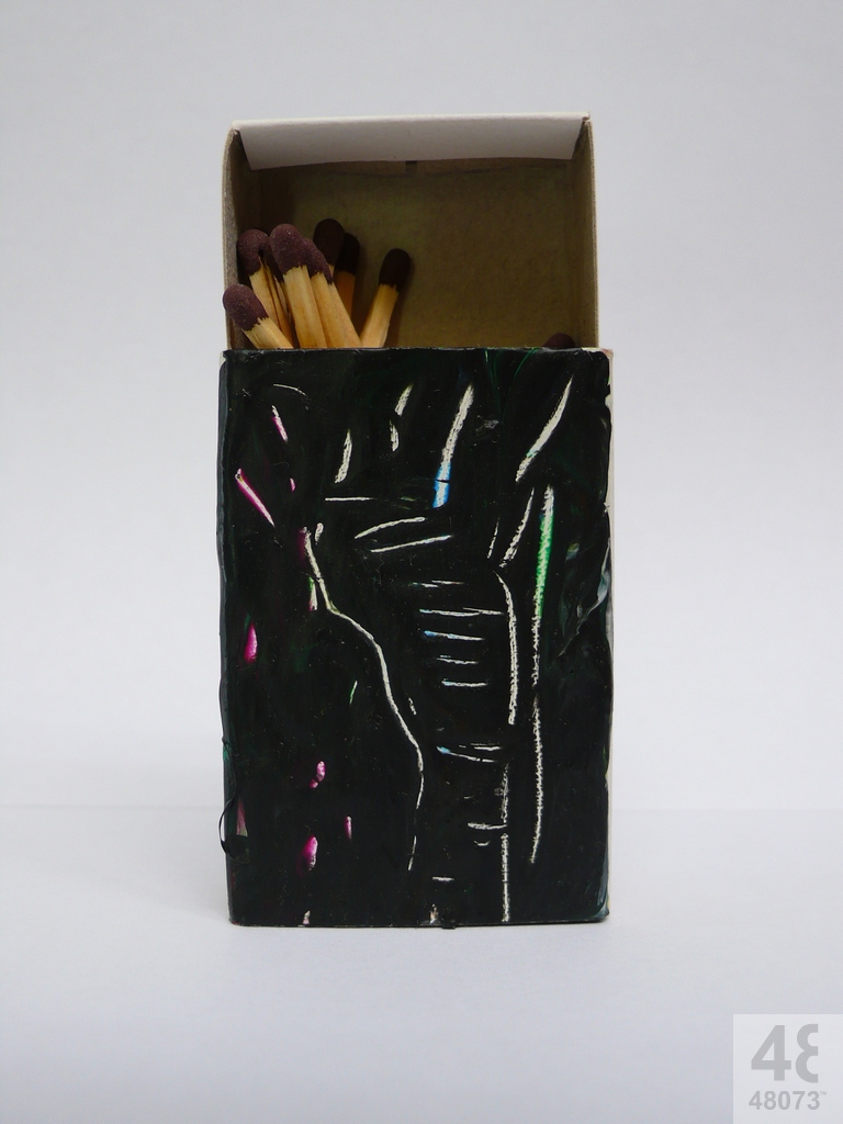 Small abstract painting on matchbox.