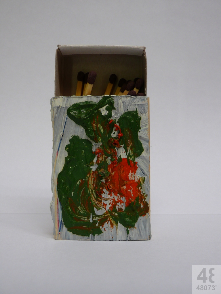 Small abstract painting on matchbox.