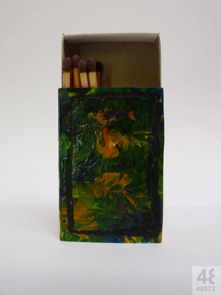 Small abstract painting on matchbox.