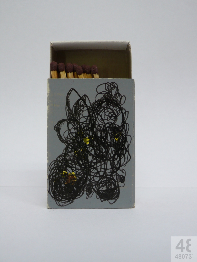 Small abstract painting on matchbox.