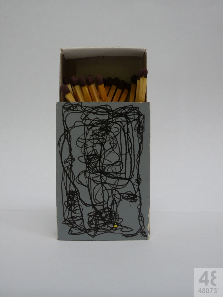 Small abstract painting on matchbox.