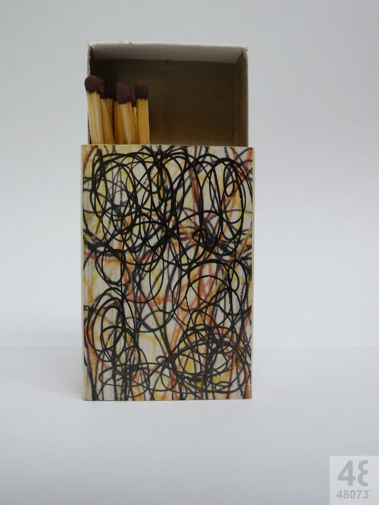 Small abstract painting on matchbox.