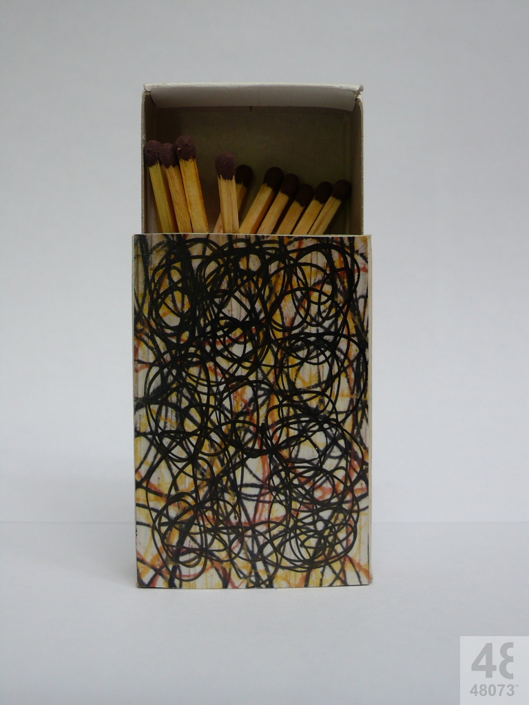 Small abstract painting on matchbox.