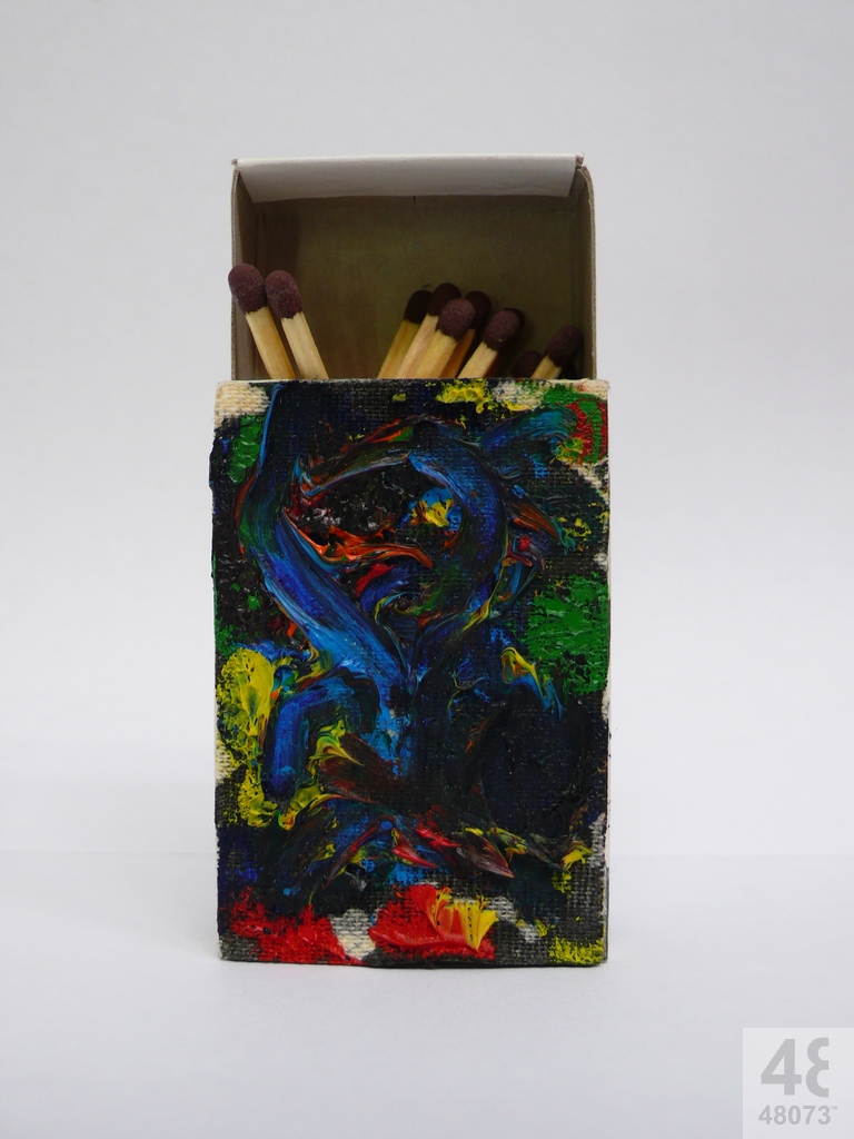 Small abstract painting on matchbox.