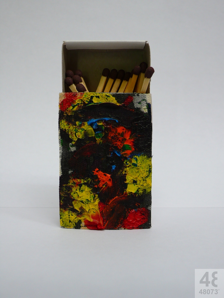 Small abstract painting on matchbox.