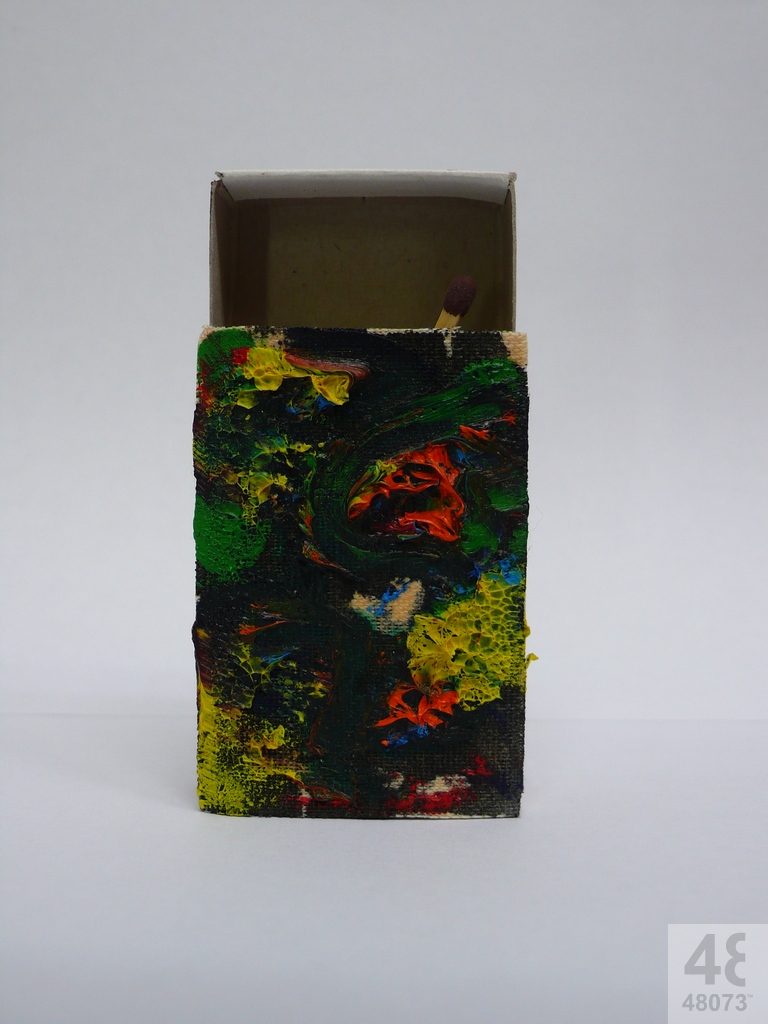 Small abstract painting on matchbox.